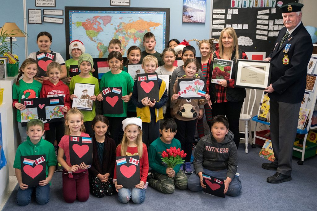 The Grade 3/4 class with Mar and Sgt. Kelly Watson. Ashley Martens photo.